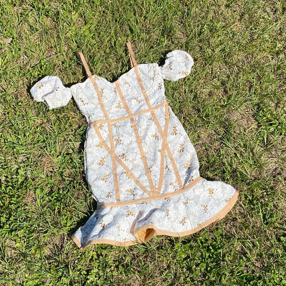 Show stopping made to look vintage corset, like mini dress